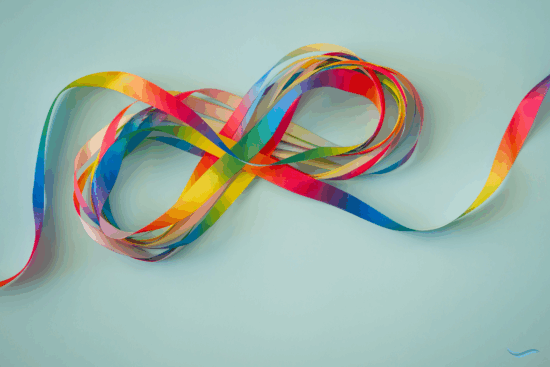 A colorful rainbow ribbon arranged in the shape of an infinity symbol on a light blue background, representing autism awareness and neurodiversity.