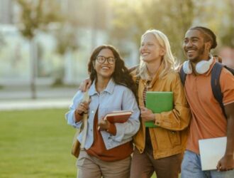 Three students walking